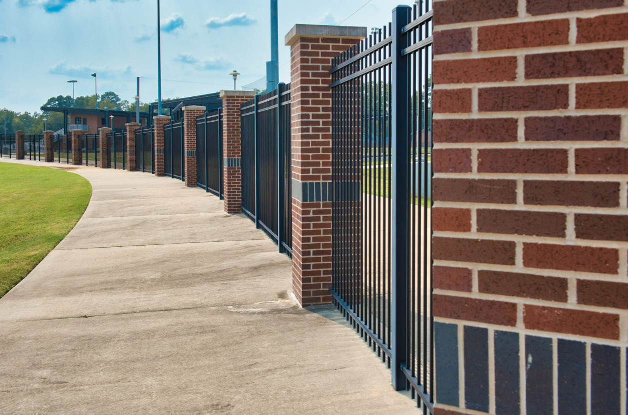 Professional technician repairing a commercial gate, showcasing expert service by Garage Door Repair in Baltimore, OH.