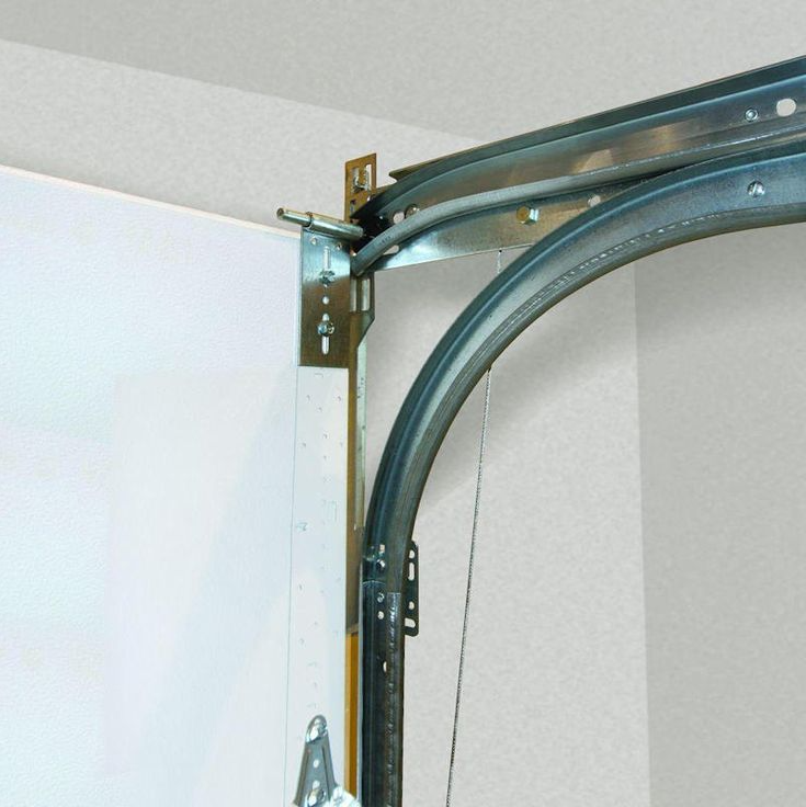 Professional technician performing garage door track repair with precision in Columbus, OH